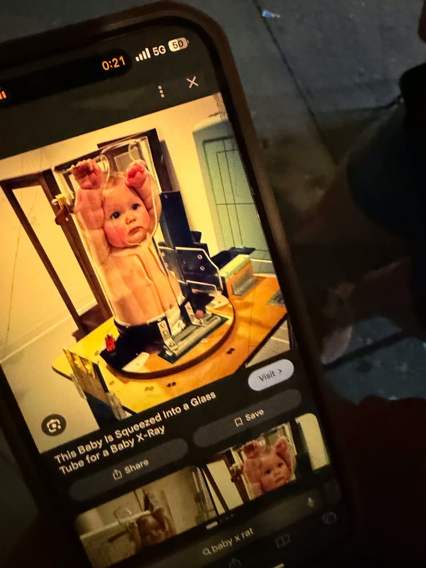 Phone photo of a baby in an X-ray tube