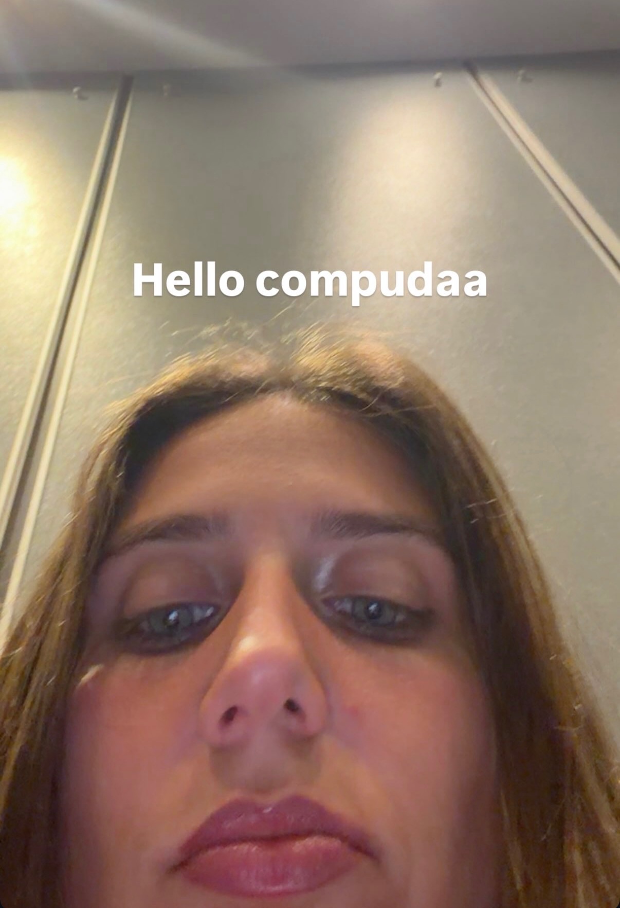 Selfie captioned Hello compudaa